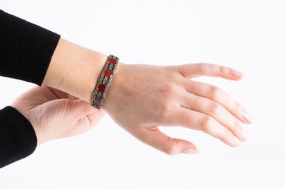 Gold and silver bracelet adorned with rectangular...