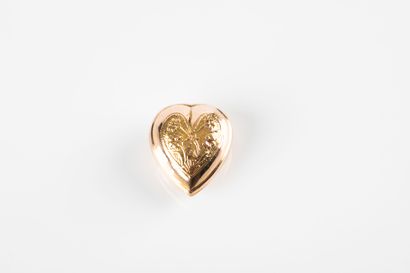 Gold casting representing a heart with floral...