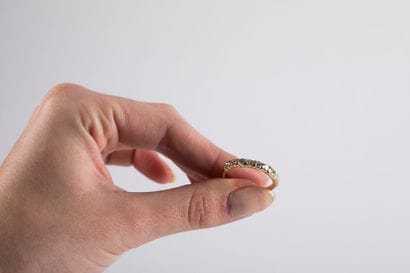 Gold half wedding band set with nine brilliant-cut...