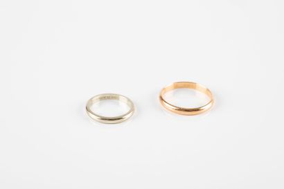 Two wedding rings in yellow and white gold....