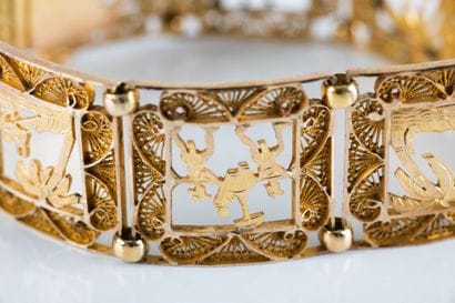 Yellow gold bracelet decorated with openwork...