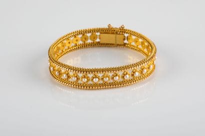 Yellow gold bracelet with pearl decoration,...