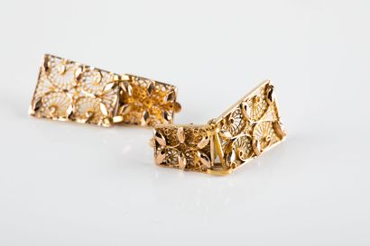Pair of clip-on earrings with filigree plates....