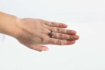White gold ring set with an 8/8 cut diamond...