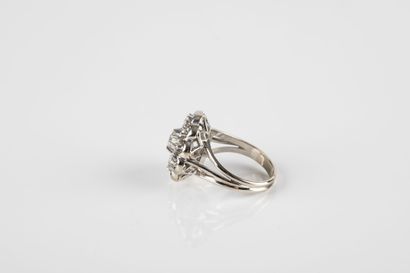 Gold and platinum daisy ring set with a diamond...