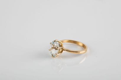Yellow gold ring holding an oval topaz (10.15x8.05mm)....
