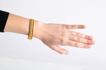 Yellow gold bracelet with pearl decoration,...