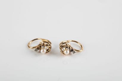 Pair of yellow gold sleeper earrings set...
