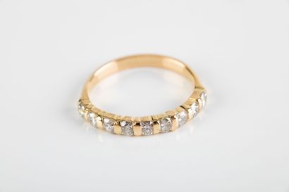 Gold half wedding band set with nine brilliant-cut...