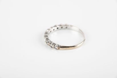 Half wedding band set with eleven brilliant-cut...