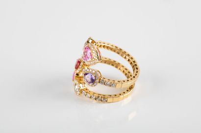 Yellow gold ring set with two pink sapphires,...