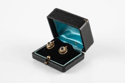 Pair of yellow gold sleeper earrings, centered...