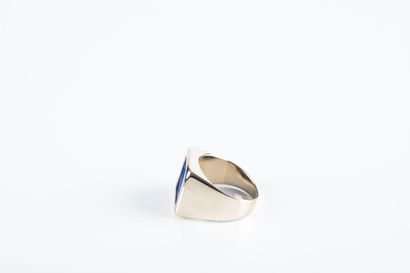 Gold signet ring holding a lapis lazuli intaglio...