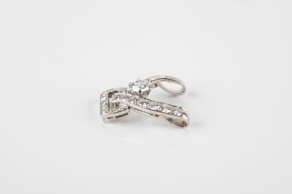 Platinum pendant (transformed) centered by...