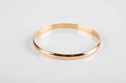 Solid yellow gold bracelet. Interior dimension:...