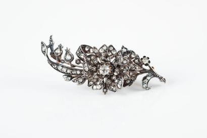 Pink gold and silver brooch with floral design...