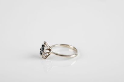 Gold ring set with oval sapphires and brilliant-cut...