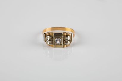 Gold ring decorated with geometric patterns...