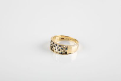 Yellow gold checkerboard ring set with diamonds...