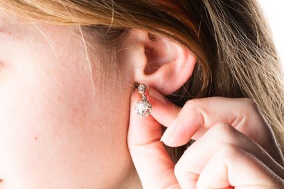 Pair of gold and platinum sleeper earrings...
