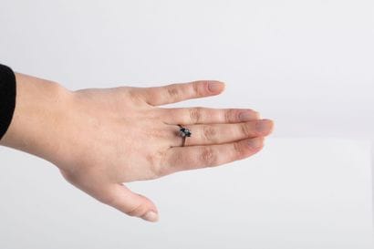 Gold ring set with oval sapphires and brilliant-cut...