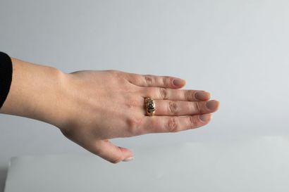 Gold ring set with a brilliant-cut diamond...