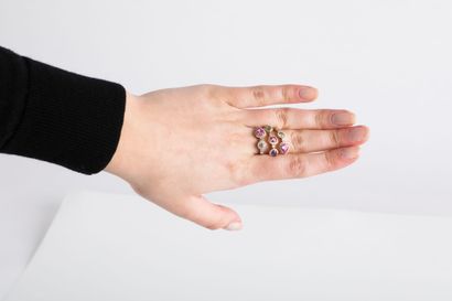 Yellow gold ring set with two pink sapphires,...