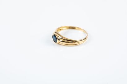 Yellow gold ring set with a sapphire (slightly...