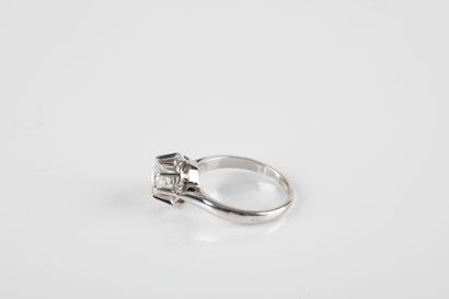 White gold solitaire ring holding a brilliant-cut...