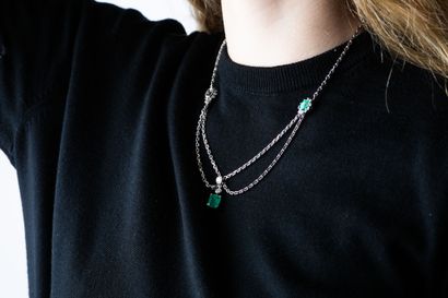 Necklace stylizing a drapery in white gold...