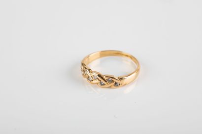 Yellow gold half wedding band with braided...