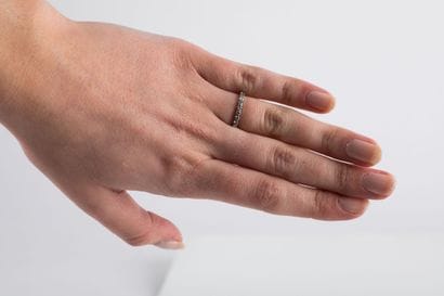 Half wedding band set with eleven brilliant-cut...