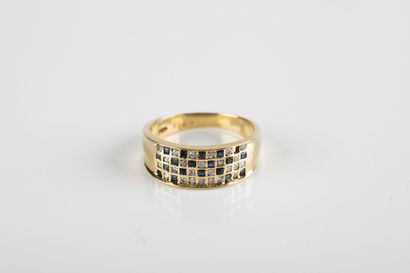 Yellow gold checkerboard ring set with diamonds...