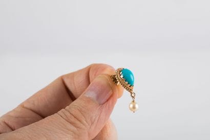 Pair of gold earrings adorned with pear cabochon...