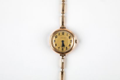 LONGINES lady's wristwatch in gold 585 thousandths....