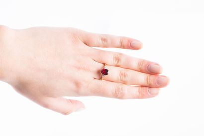 Yellow gold ring decorated with a cushion...
