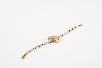 LONGINES lady's wristwatch in gold 585 thousandths....