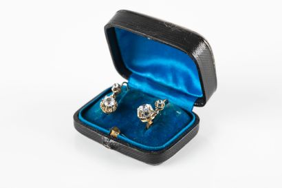 Pair of yellow gold earrings adorned with...
