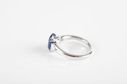 White gold ring set with a certified oval...