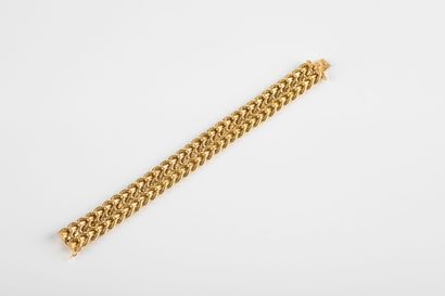 Yellow gold bracelet decorated with chevrons...