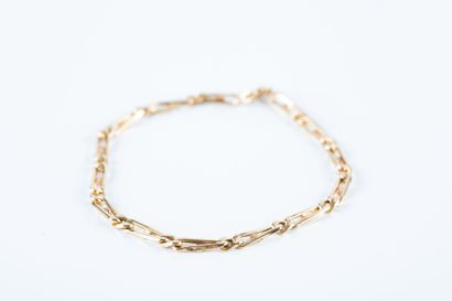 Yellow gold bracelet decorated with elongated...