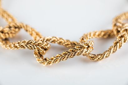Gold bracelet, double curb chain twisted....
