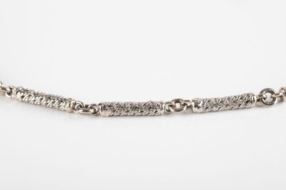 White gold long necklace composed of chiseled...