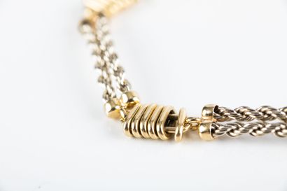 Gold bracelet composed of rectangular braided...