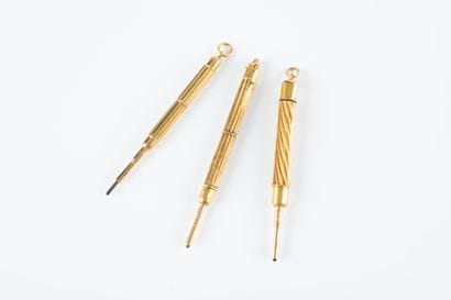 Three mechanical pencils in gold for dance...