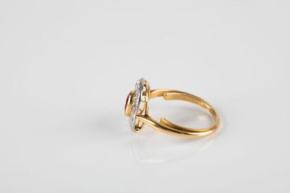 Gold and platinum ring set with a synthetic...