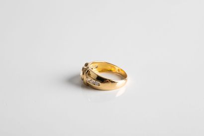 Gold ring set with a brilliant-cut diamond...
