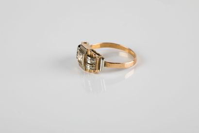 Gold ring decorated with geometric patterns...