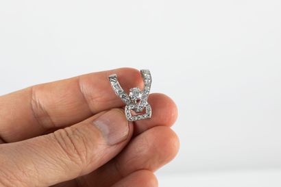 Platinum pendant (transformed) centered by...
