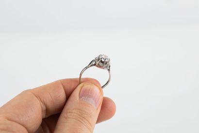 Gold and platinum solitaire ring set with...